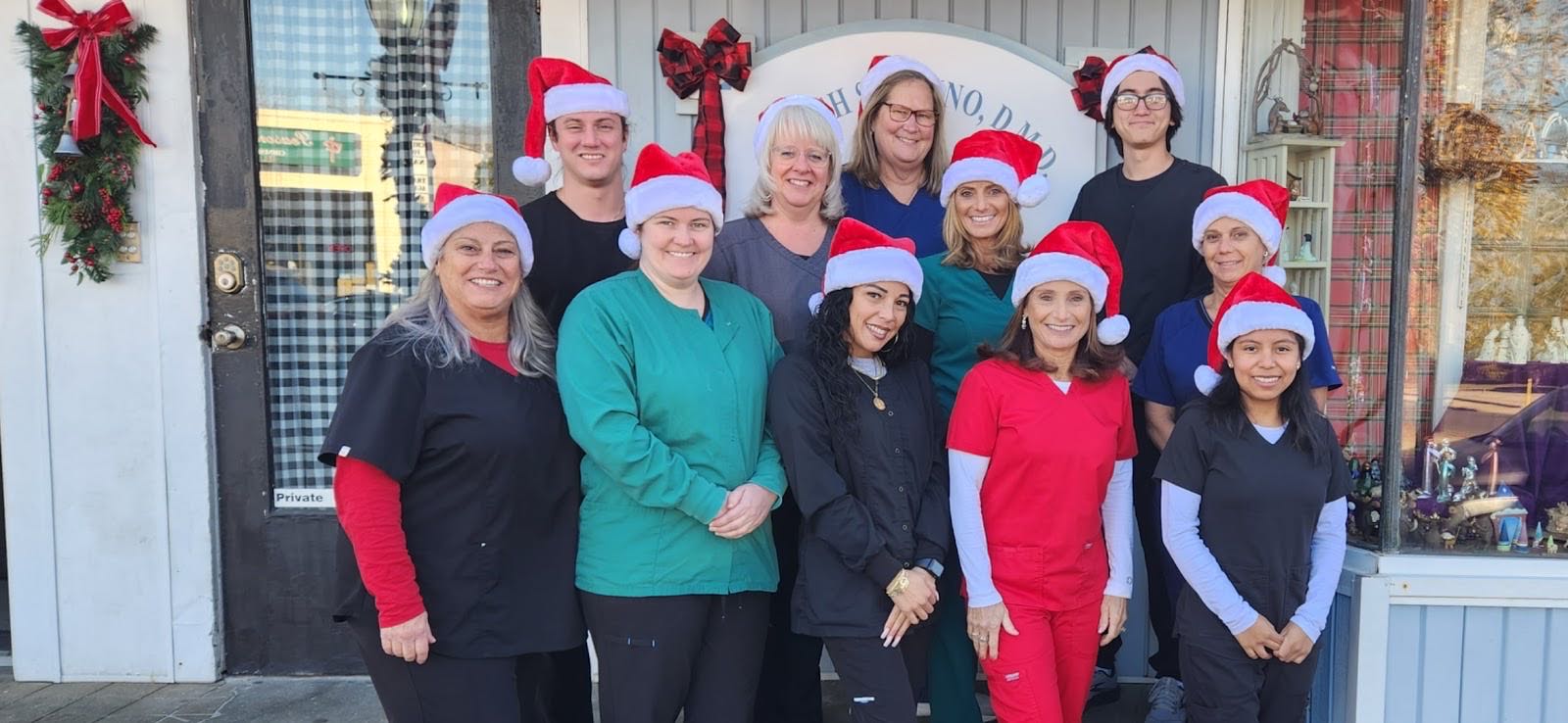 Dr. Judy and the Savino dental staff outside the Main Street office